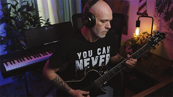 playing black guitar